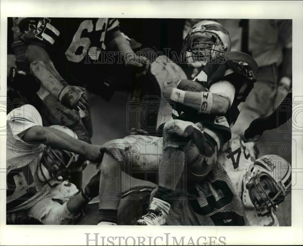 1990 Press Photo Despite the efforts of Lorain Catholics defense - cvb55287- Historic Images