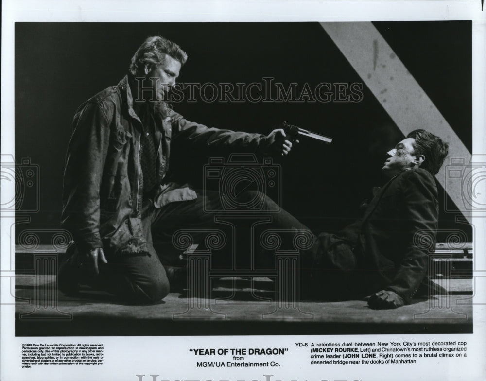 1985 Press Photo Mickey Rourke, John Lone in Year of the Dragon - cvp33093- Historic Images