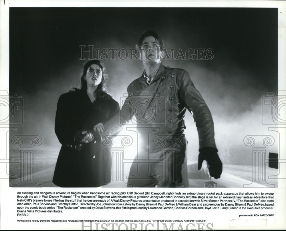 1991 Press Photo Jennifer Connelly and Bill Campbell in The Rocketeer.- Historic Images