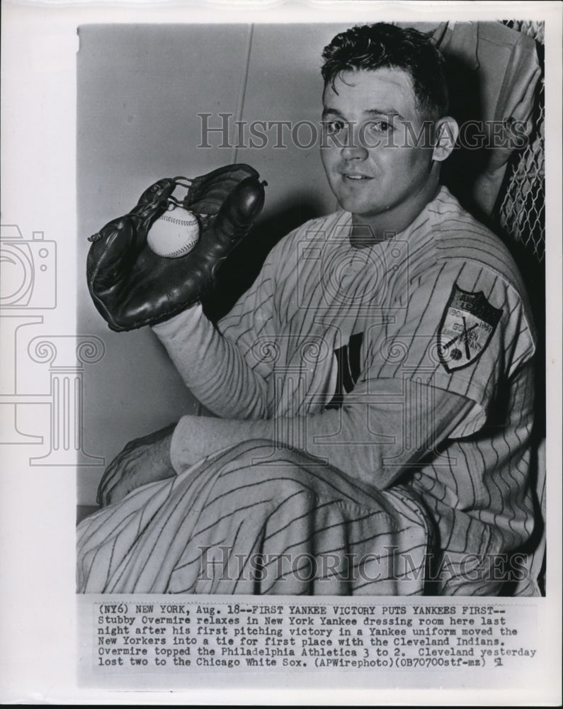 1951 Press Photo Stubby Overmire Relaxes In Yankee Dressing Room After 1st Win- Historic Images