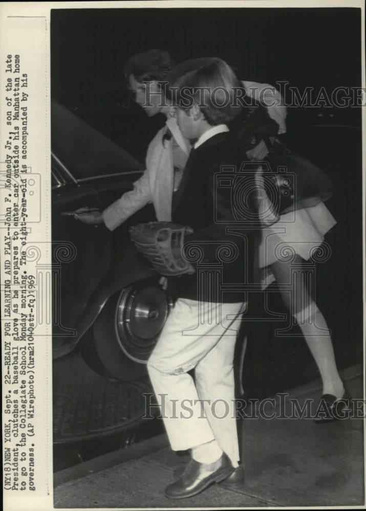 1969 Press Photo John Kennedy Jr As He Prepares To Enter A Car To Go To School- Historic Images