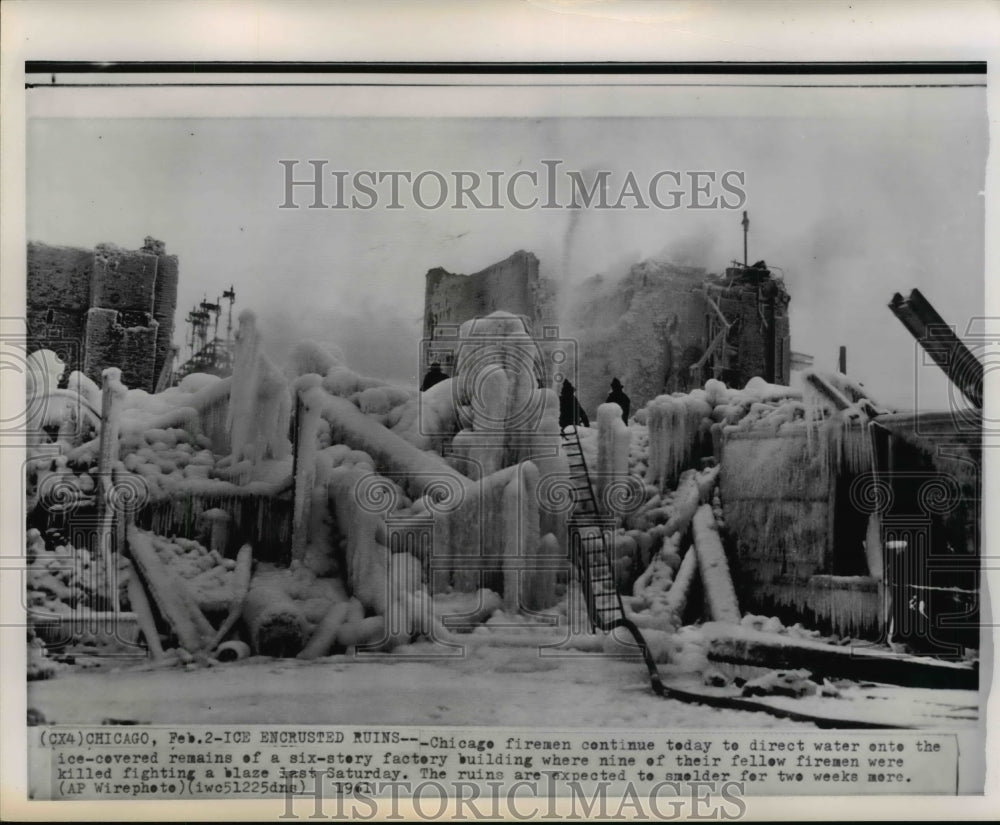 1961 Press Photo Chicago Firemen Keep on Pouring Water on Ice Covered Remains- Historic Images