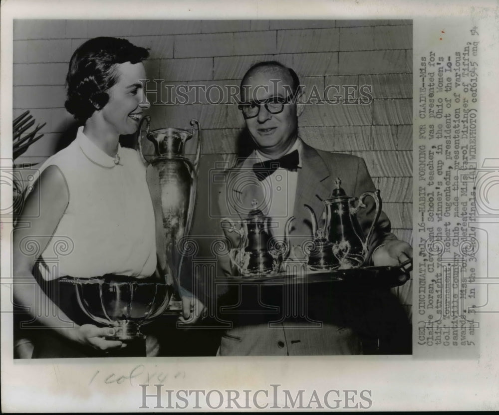 1954 Press Photo Cleveland School teacher presented winners&#39; cup in Ohio.- Historic Images