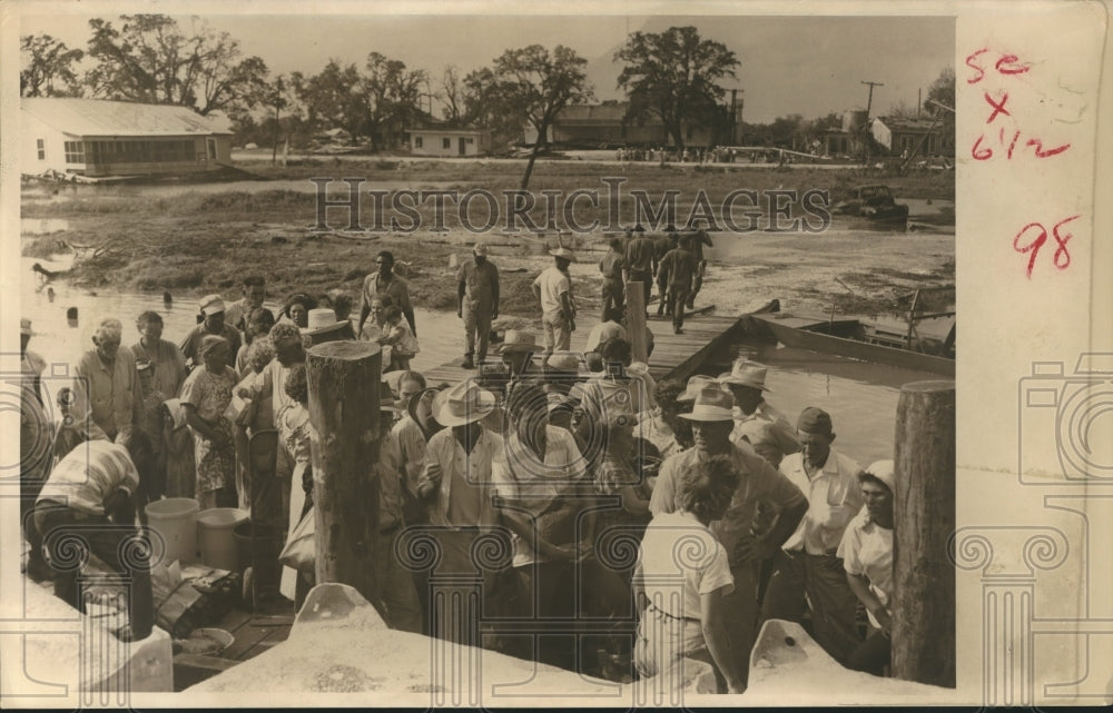 1957 Press Photo Rescues, Lake Charles, Hurricane Audrey - hca04336