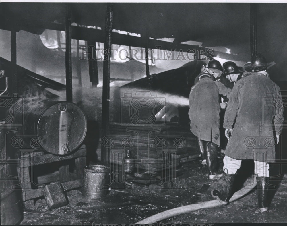 1964 Press Photo Fireman Fighting Fire At Bryson Lumber Co. - hca10587