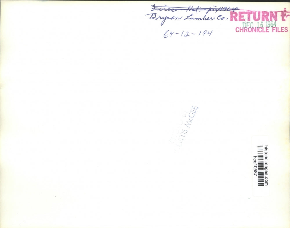 1964 Press Photo Fireman Fighting Fire At Bryson Lumber Co. - hca10587