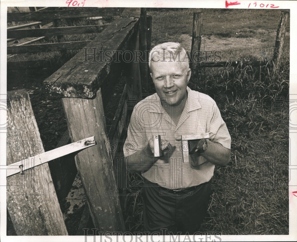 1969 Press Photo Texas Farmer Holds New Cattle Branding Irons. - hca13027- Historic Images