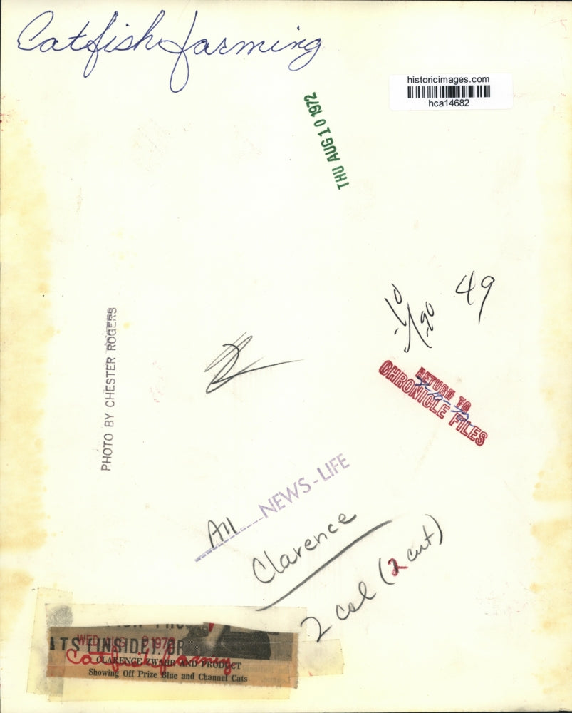 1972 Press Photo Clarence Zwahr Catfish Farmer Showing Off Prize Catch.