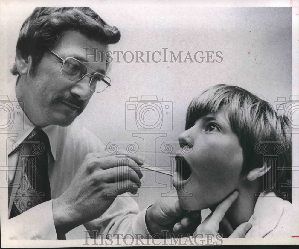 1974 Press Photo Dr. Charles Godsbee examines resident of Depelchin Faith Home