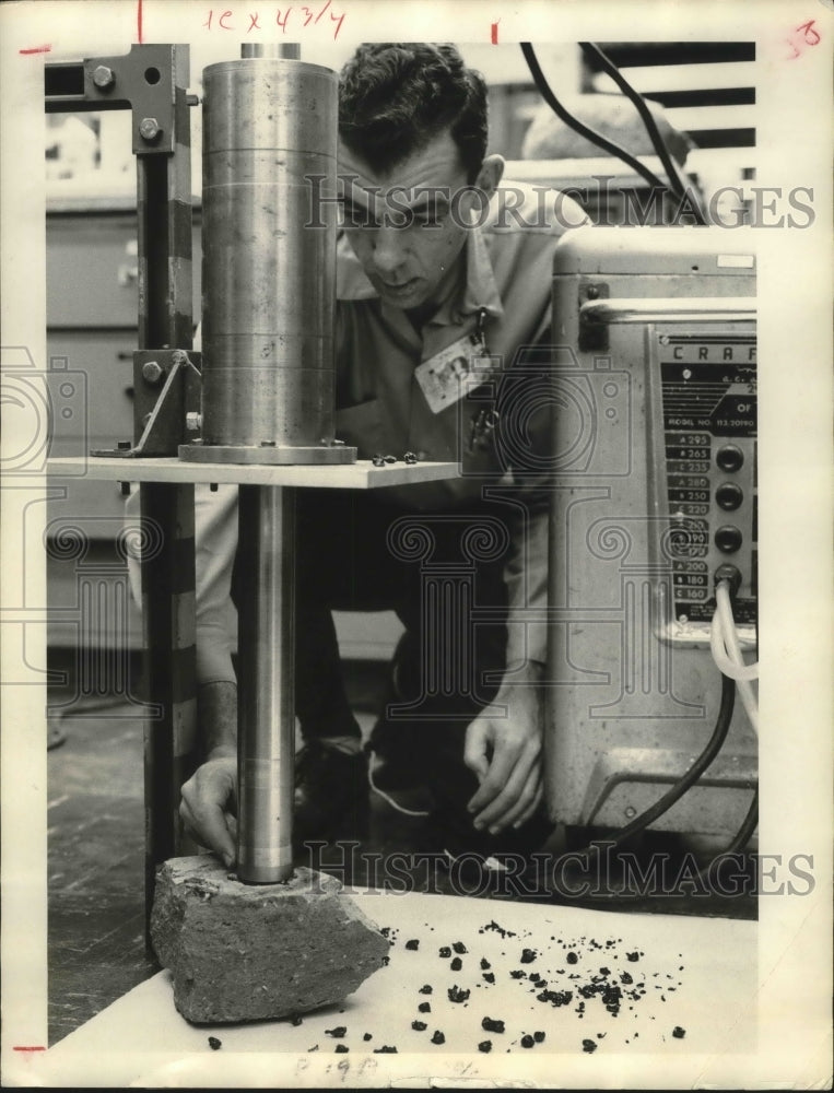 1965 Press Photo James Coleman Positions New Drill Bit For Lab Test in Houston.- Historic Images