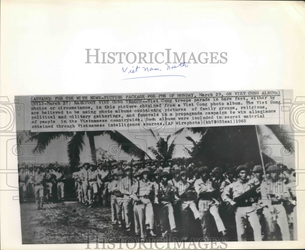 1965 Press Photo Viet Cong troops parade in bare feet, North Vietnam - hca24755
