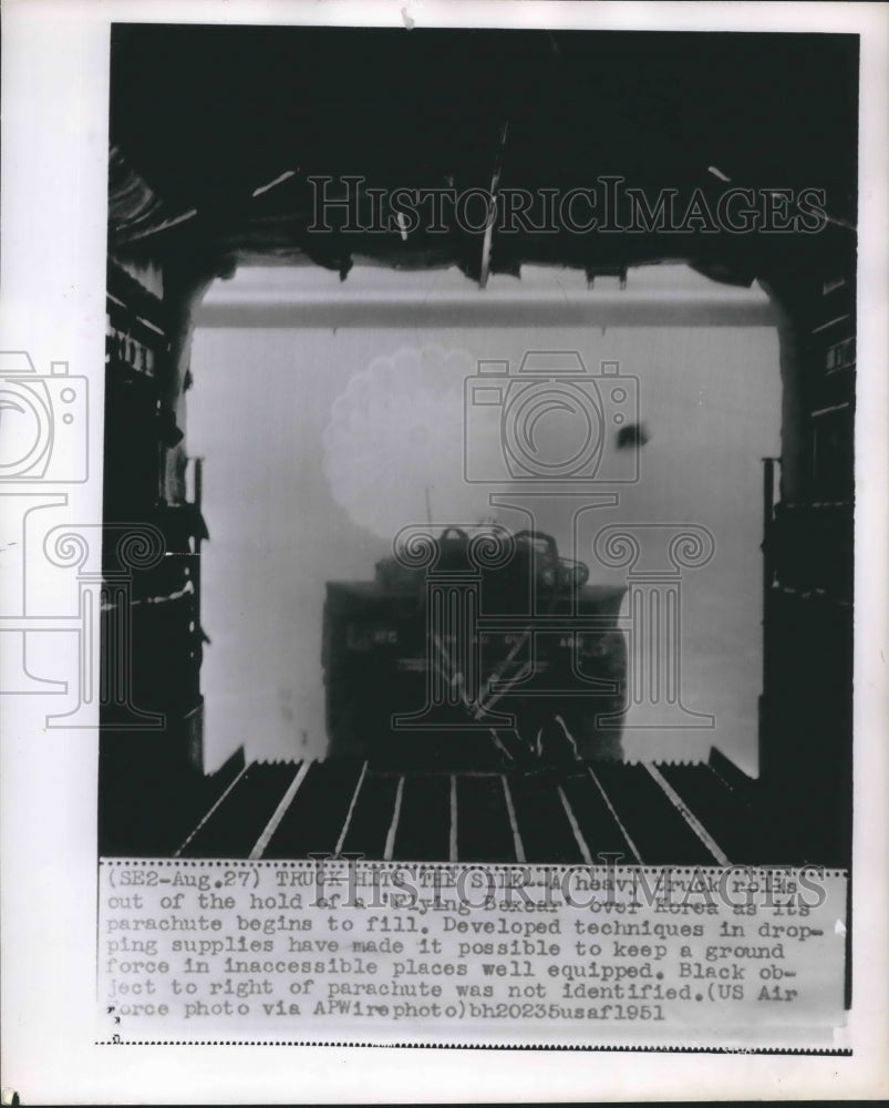 1951 Press Photo Truck rolls out of hold, 'Flying Boxcar' over Korea, Korean War- Historic Images