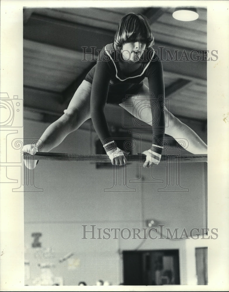 1979 Press Photo Gymnast performs on bar - hca27253- Historic Images