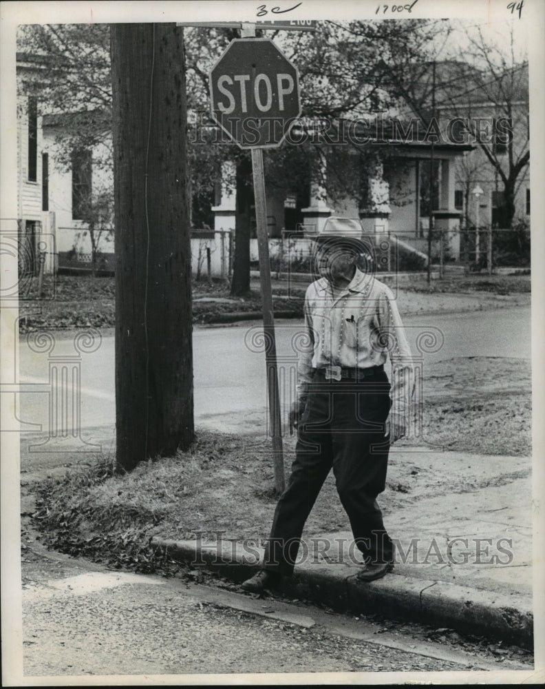 1969 Press Photo Man walks on sidewalk - hca28775- Historic Images