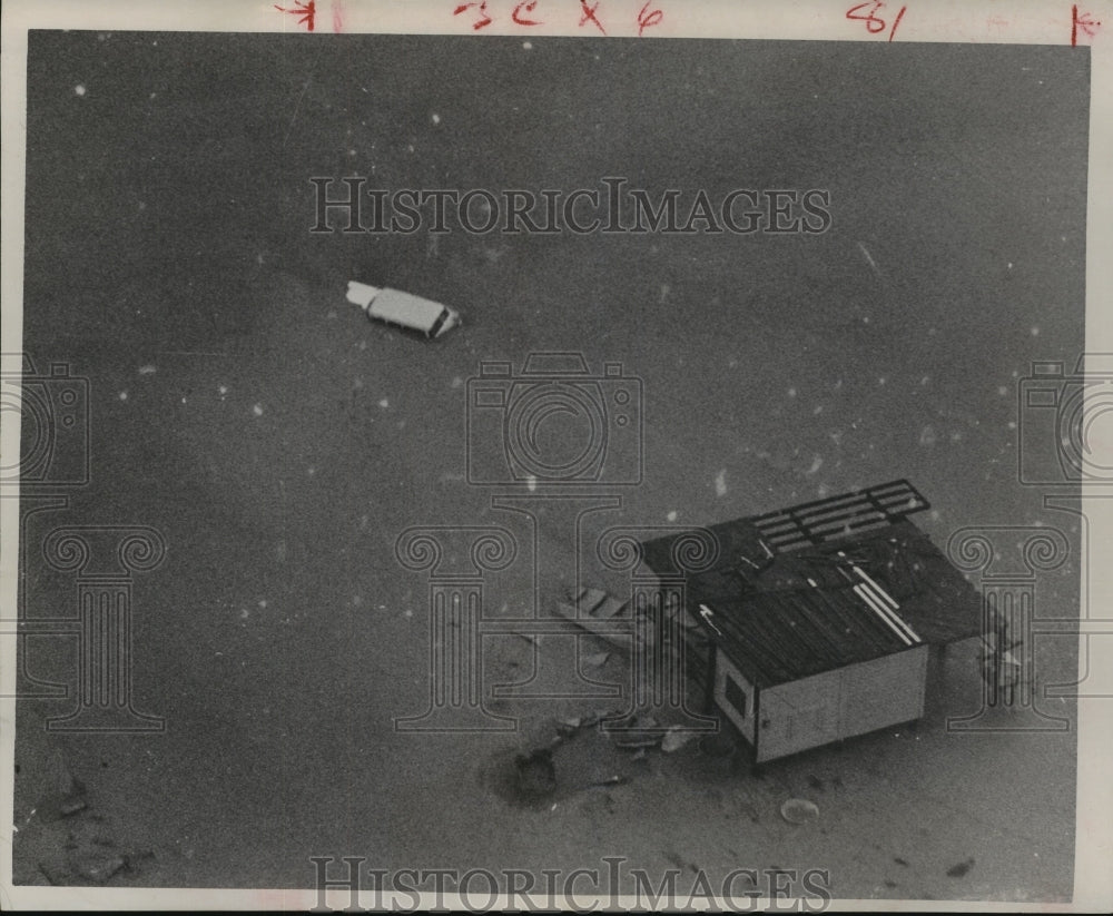 1962 Press Photo Hurricane Cindy leaves car buried in the sand in Texas