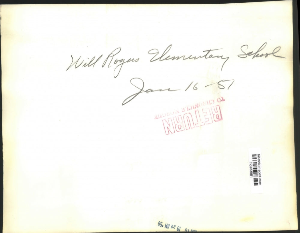 1950 Press Photo Students ride bike by Will Rogers Elementary School - hca33961