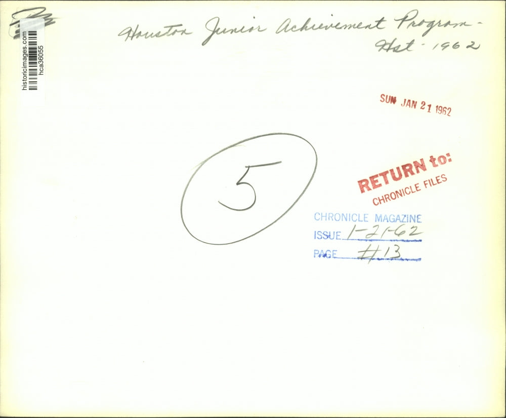 1962 Press Photo Houston Jr Achievement members with giraffe coat rack