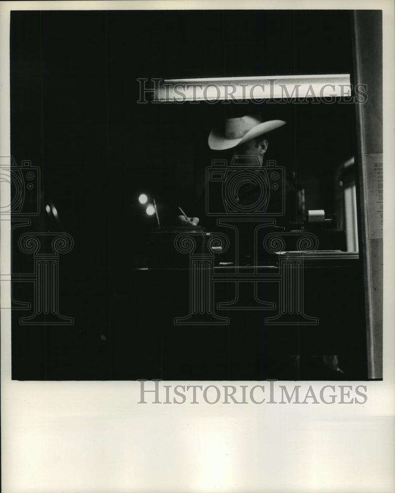 1963 Press Photo Man wearing cowboy hat inside Johnson City, Texas building