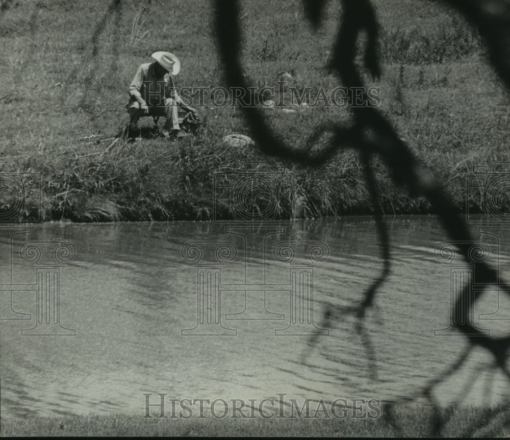 1965 Press Photo Man fishes on Pedernales River near LBJ Ranch in Texas