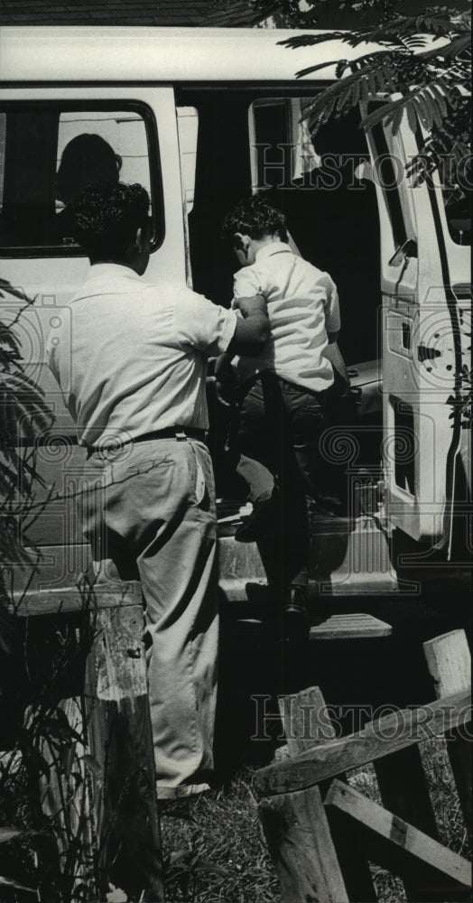1968 Press Photo Father helps son on Special Neighborhood School bus in Houston