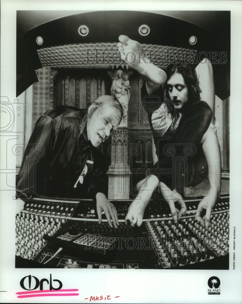 1994 Press Photo Orb music group members - distorted view at mixing board- Historic Images