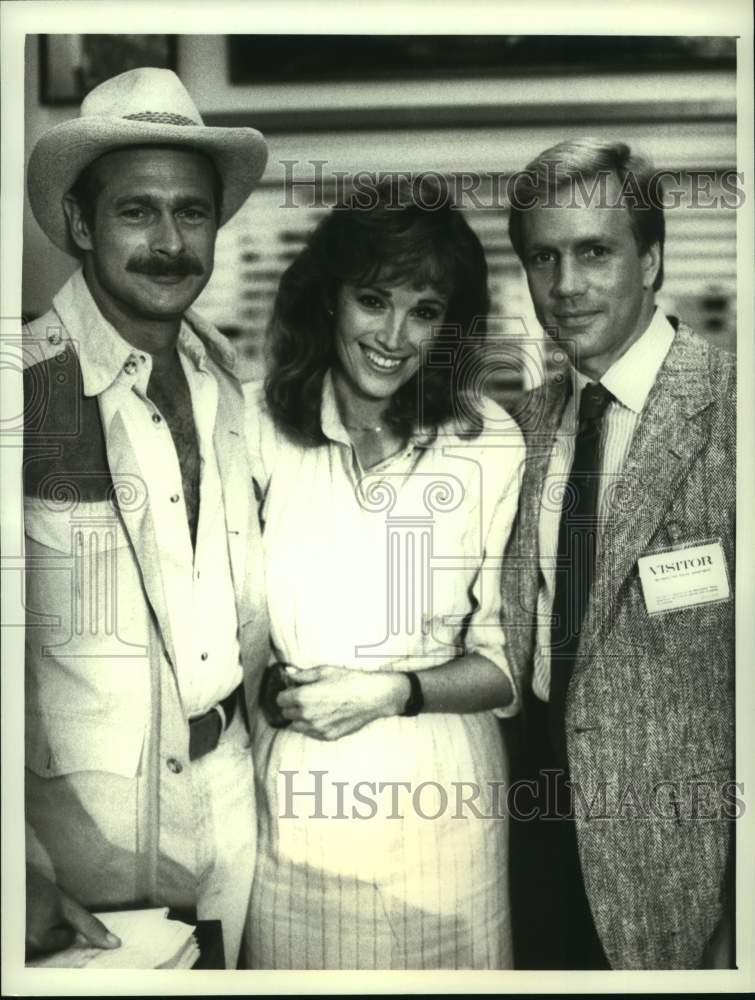 1988 Press Photo Rick &amp; A.J. join forces with flight attendant on Simon &amp; Simon- Historic Images