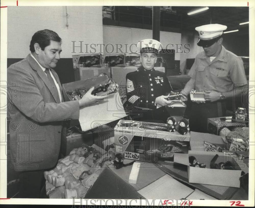 1985 Press Photo Confiscated Toys Donated to the Toys for Tots Program- Historic Images