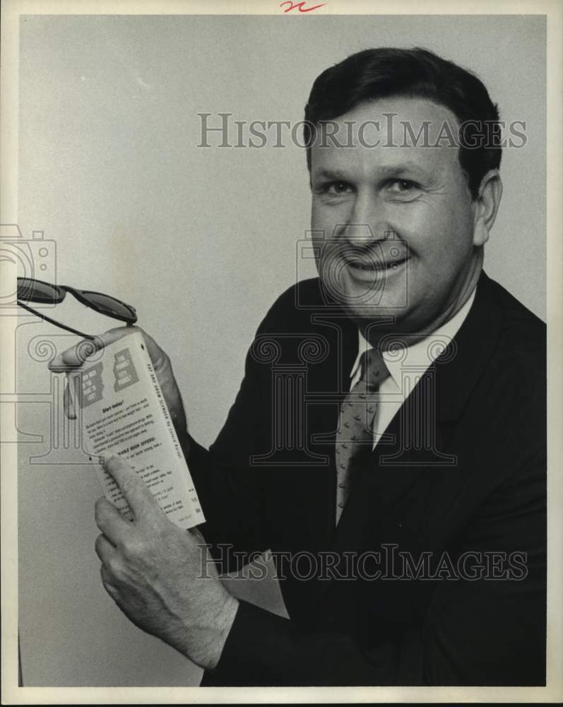 1967 Press Photo Wig Model Mr. Gray Holding Book and Sunglasses - hca57906- Historic Images