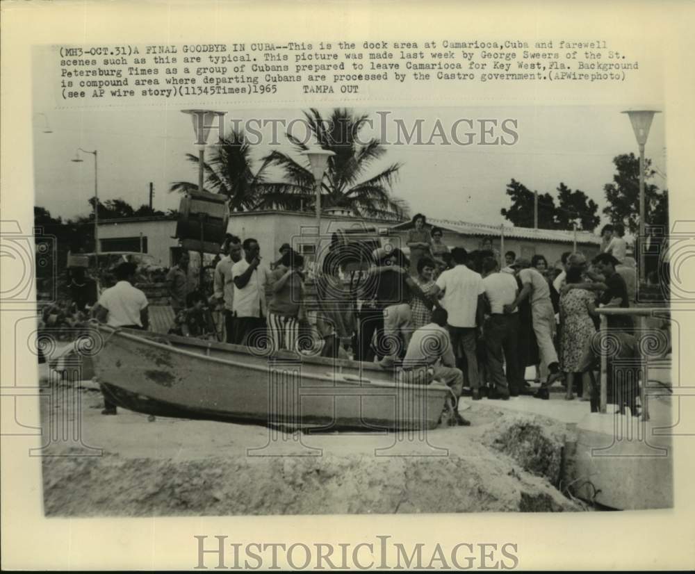 1965 Press Photo Cubans Departing From Dock Area at Compound in Camarioca, Cuba- Historic Images