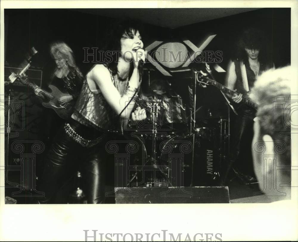 1988 Press Photo Members of XOX Rock Music Group Performing At Blythes- Historic Images