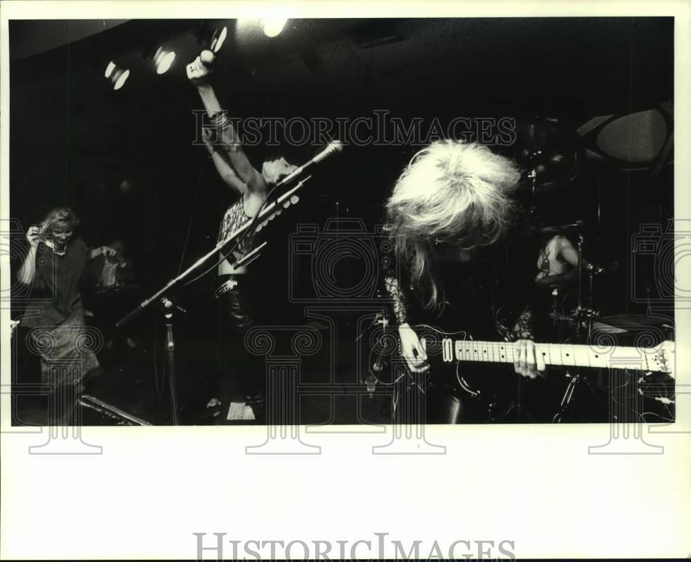 1988 Press Photo Members of XOX Rock Music Group Performing At Blythes- Historic Images