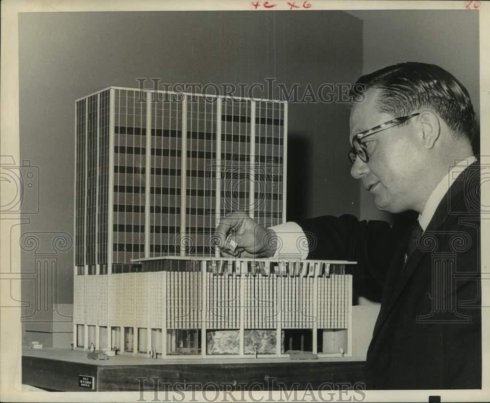 1959 Press Photo Vaughan Bryant examines model of World Trade Center, Houston- Historic Images