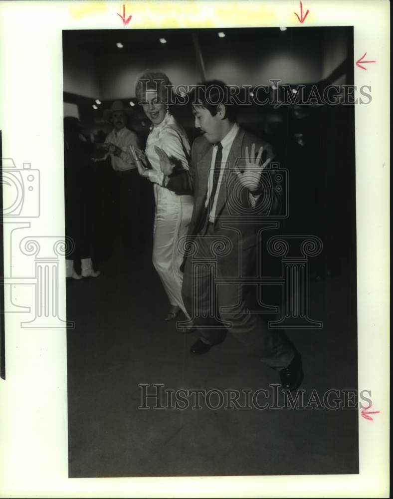 1989 Press Photo Ginger Bell &amp; Yuki dancing at Houston Rodeo event - hca62379- Historic Images