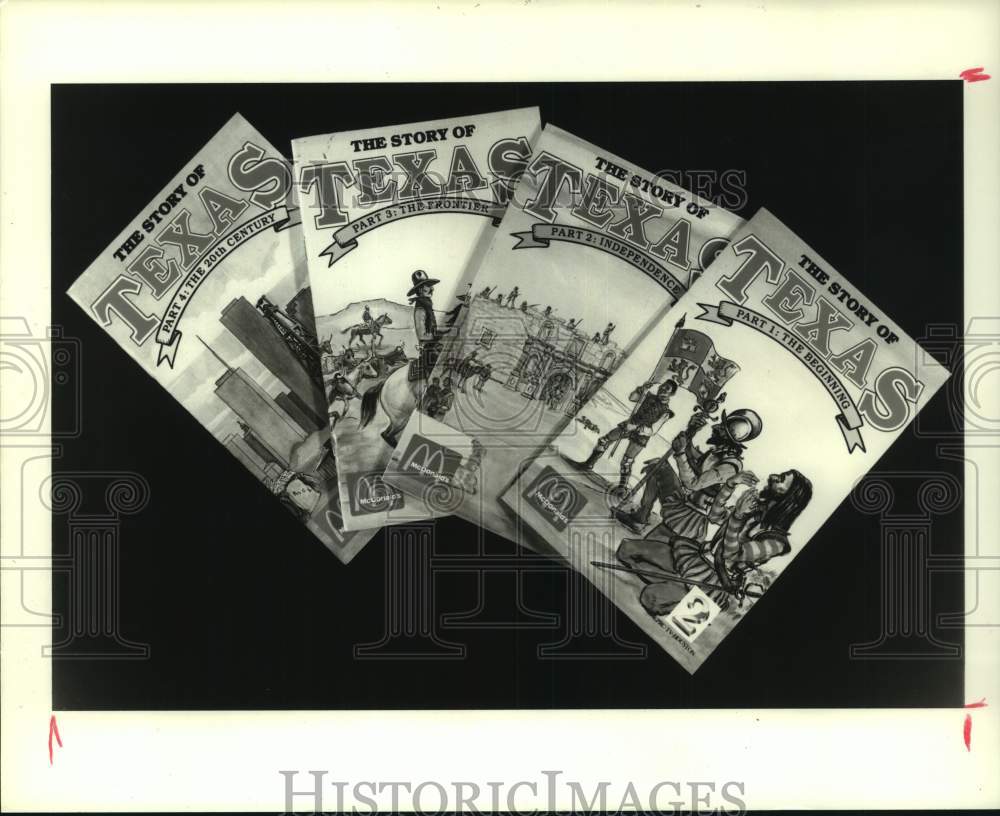 1986 Press Photo Texas Sesquicentennial books - McDonald&#39;s Happy Meal prize- Historic Images