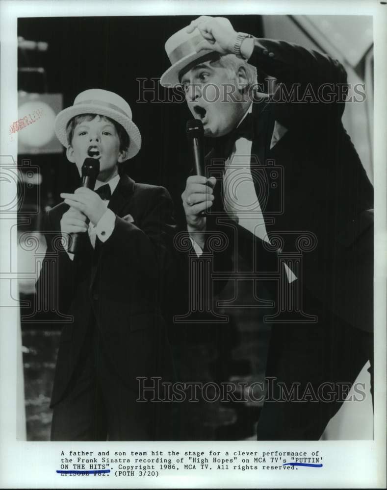 1986 Press Photo Father and Son Team Perform on MCA TV&#39;s &quot;Puttin&#39; On The Hits&quot;- Historic Images