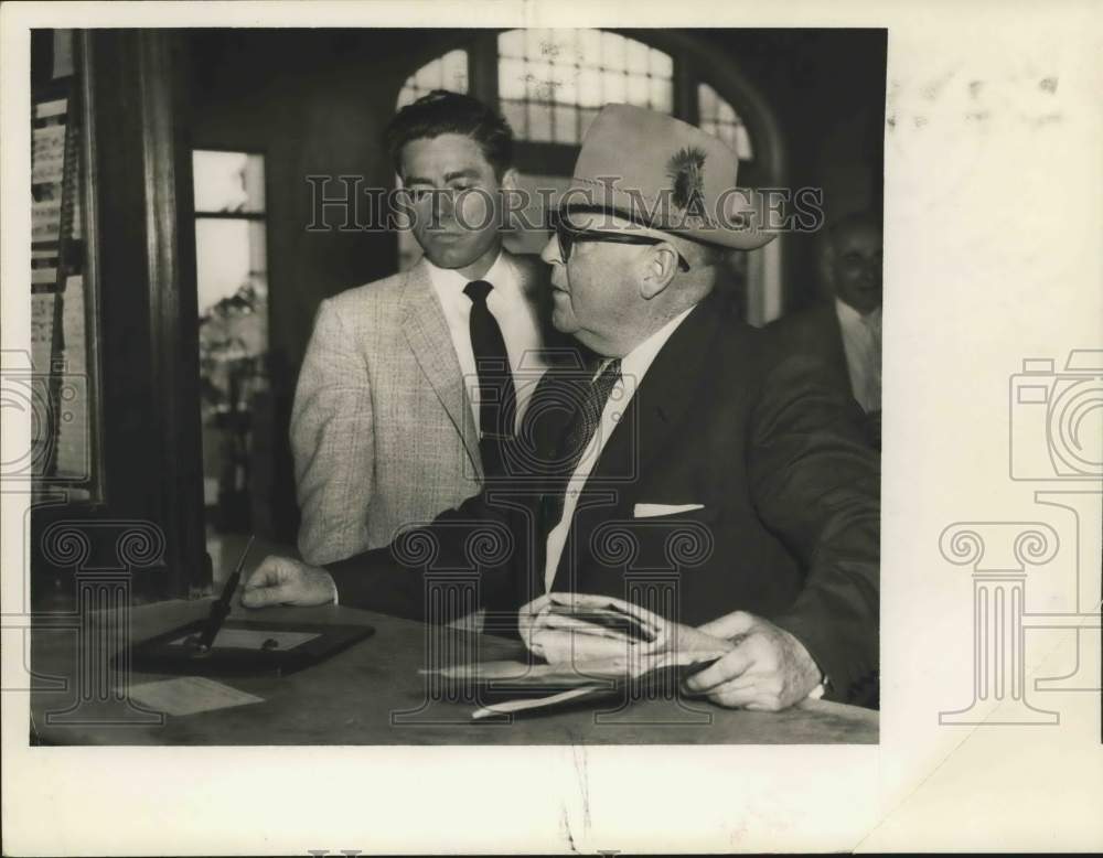 1957 Press Photo Two businessmen - hca69189