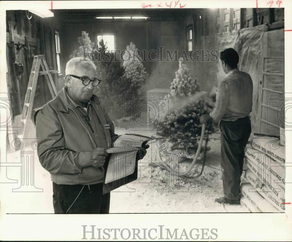 1966 Press Photo Herman Bering and helper flocking Christmas trees - hca71425- Historic Images