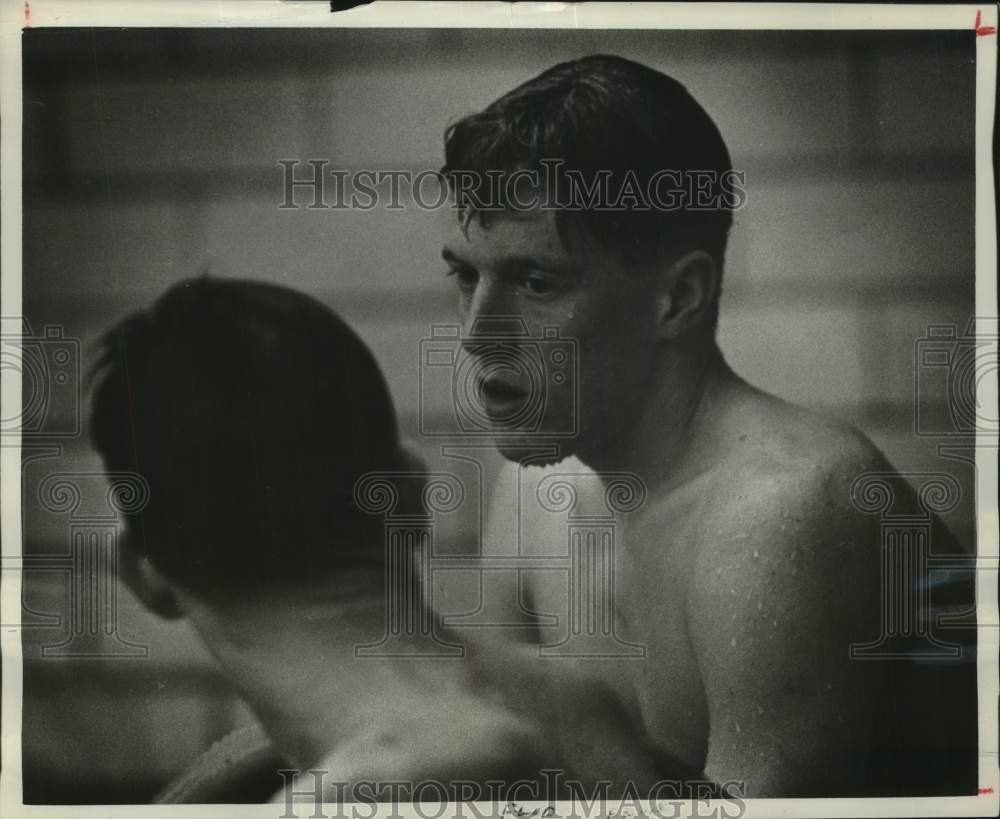 1963 Press Photo Exhausted swimmer Kris Brown takes a break before next race.- Historic Images