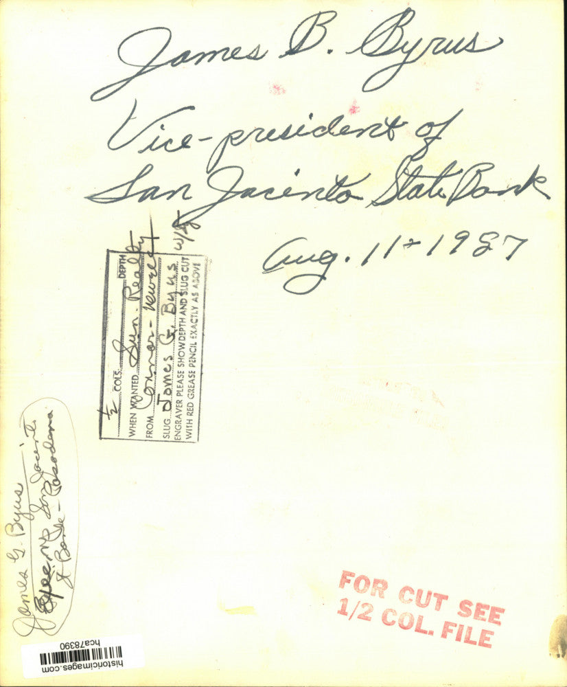 1957 Press Photo James Byrus, Vice Pres. of San Jacinto State Bank signs a paper