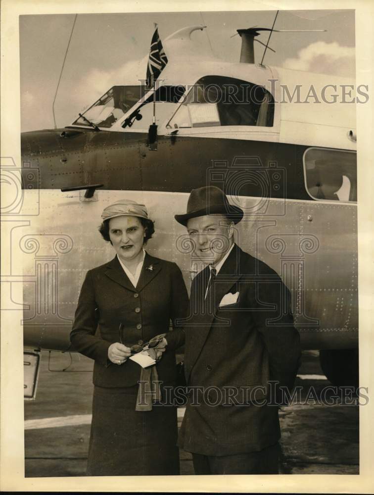 1956 Press Photo Sir Harold Caccia and wife in front of airplane - hca80597