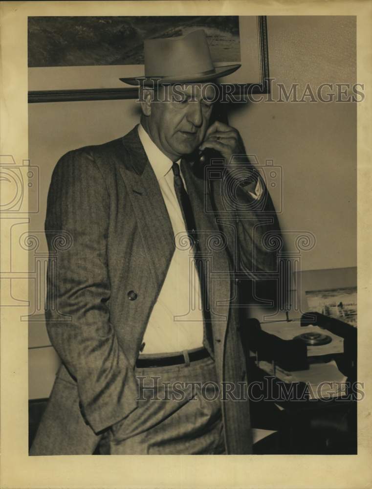 1956 Press Photo Fire marshal P.W. Clooney takes phone call - hca81147