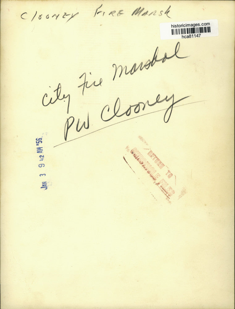 1956 Press Photo Fire marshal P.W. Clooney takes phone call - hca81147