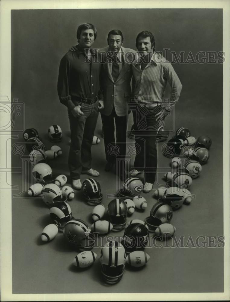 1974 Press Photo Sportscaster Howard Cosell, friends surrounded by sport gear- Historic Images