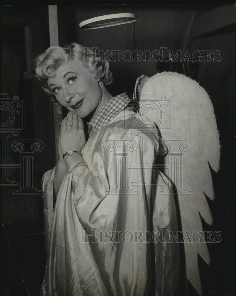 1953 Press Photo Woman dressed as a angel with a halo. - hca86420