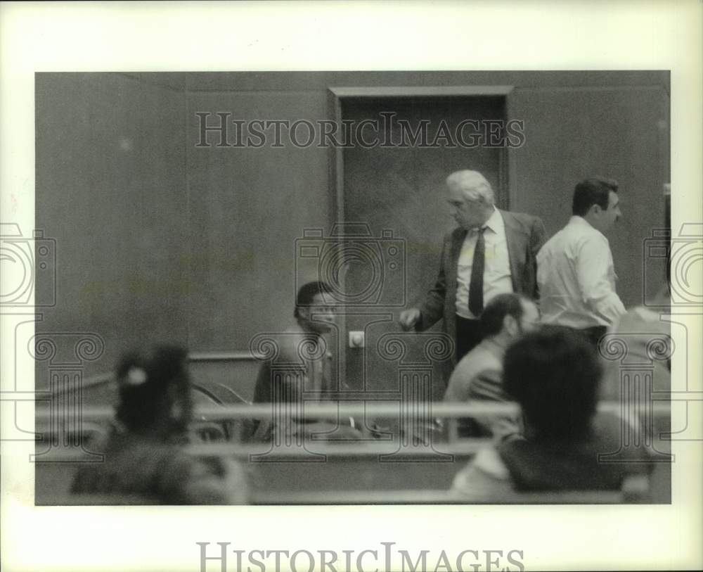 1986 Press Photo Illya Ray Daniel waits, charged in police shooting. - hca87833