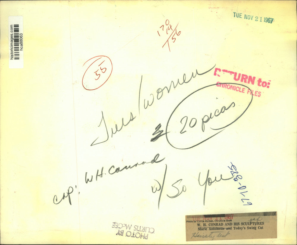 1967 Press Photo W.H. Conrad with his sculptures of different hairstyles