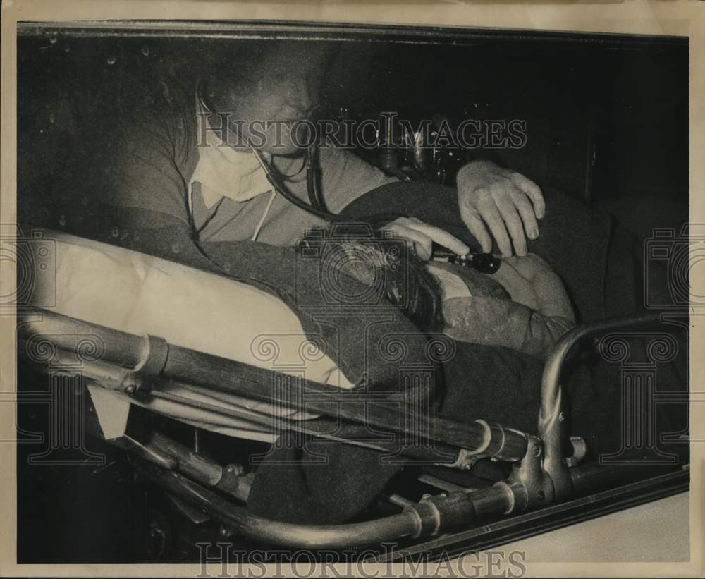 1967 Press Photo Theresa Fregia checked by doctor after rescue from well shaft
