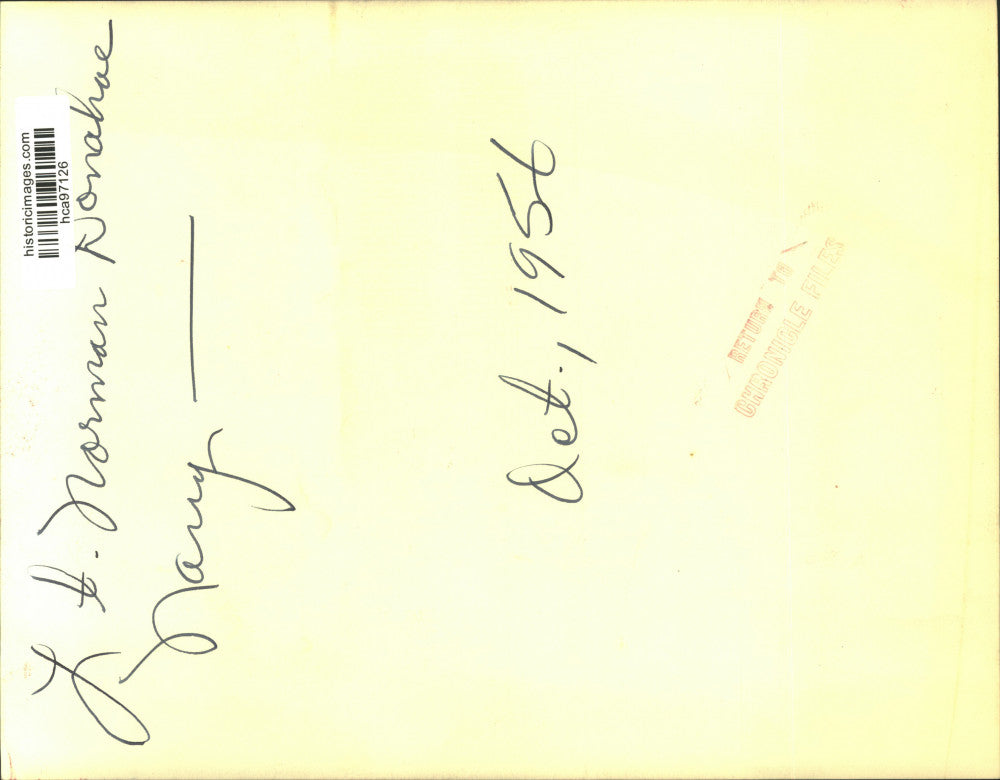 1956 Press Photo Lt. Norman Donahoe feeds children breakfast - hca97126