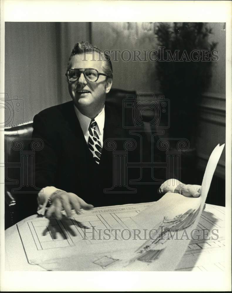 Press Photo Deil Gustafson reviews casino plans - hcb09474- Historic Images