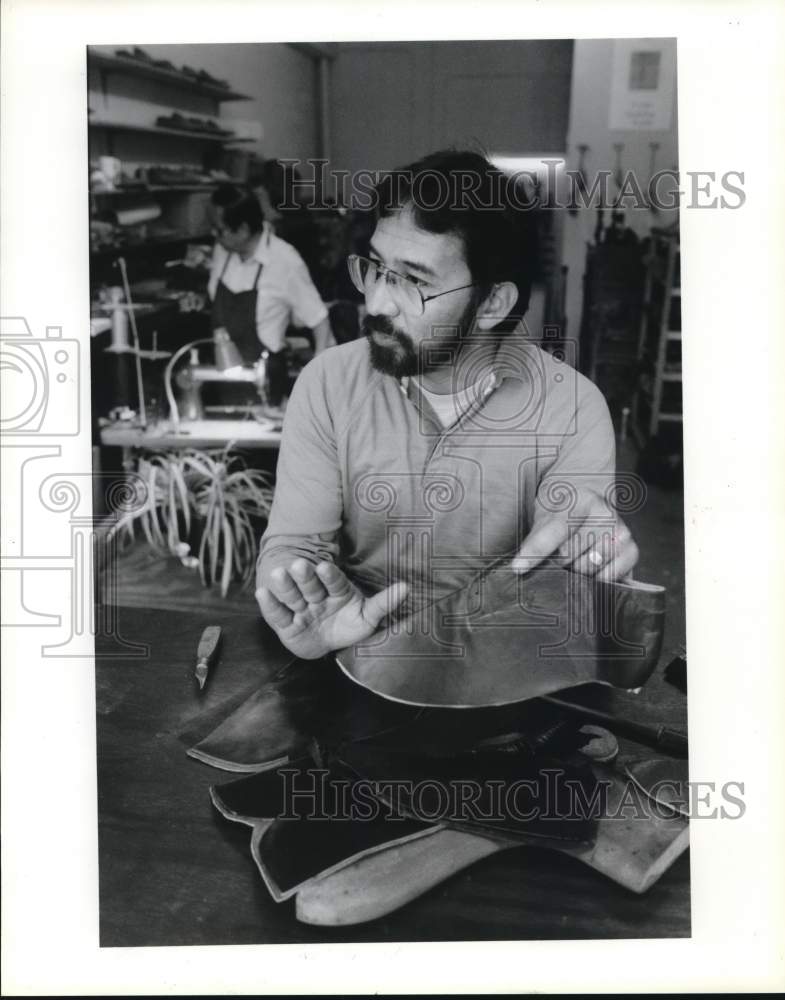 1988 Press Photo Boot maker Jesus Medel working on new pair of boots - hcb39017- Historic Images